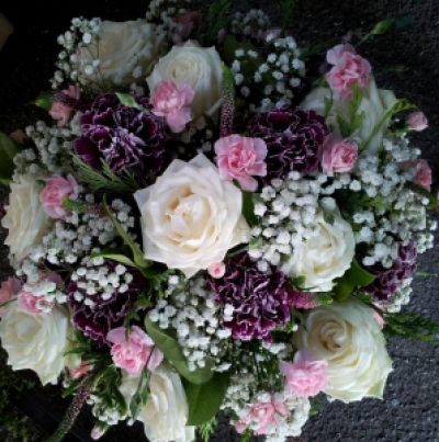 funeral posy - Funeral posy in white and pink.  other colours available please state when ordering. Suitable flowers will be selected by florist.  Photo shows medium size posy.